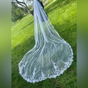 Selling unworn, unused white cathedral veil from Etsy! 118in long.